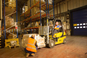 Loading a forklift.