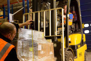 Loading a forklift.
