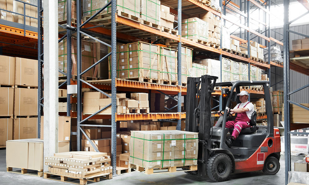 A forklift in a warehouse.